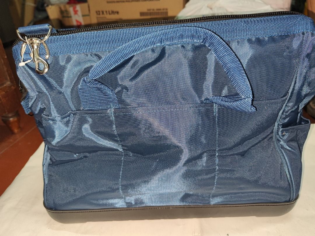 Tool Bag (Category: Construction Tools & Equipment) located in Manila. Submitted by kingkai999 (Listing ID 1330304421, Image 1). Description: A tool bag is a durable, often portable container used for storing and organizing various tools and equipment. It typically features multiple compartments, pockets, and dividers to keep tools neatly organized and easily accessible for different tasks. Tool bags come in various sizes, materials, and designs 