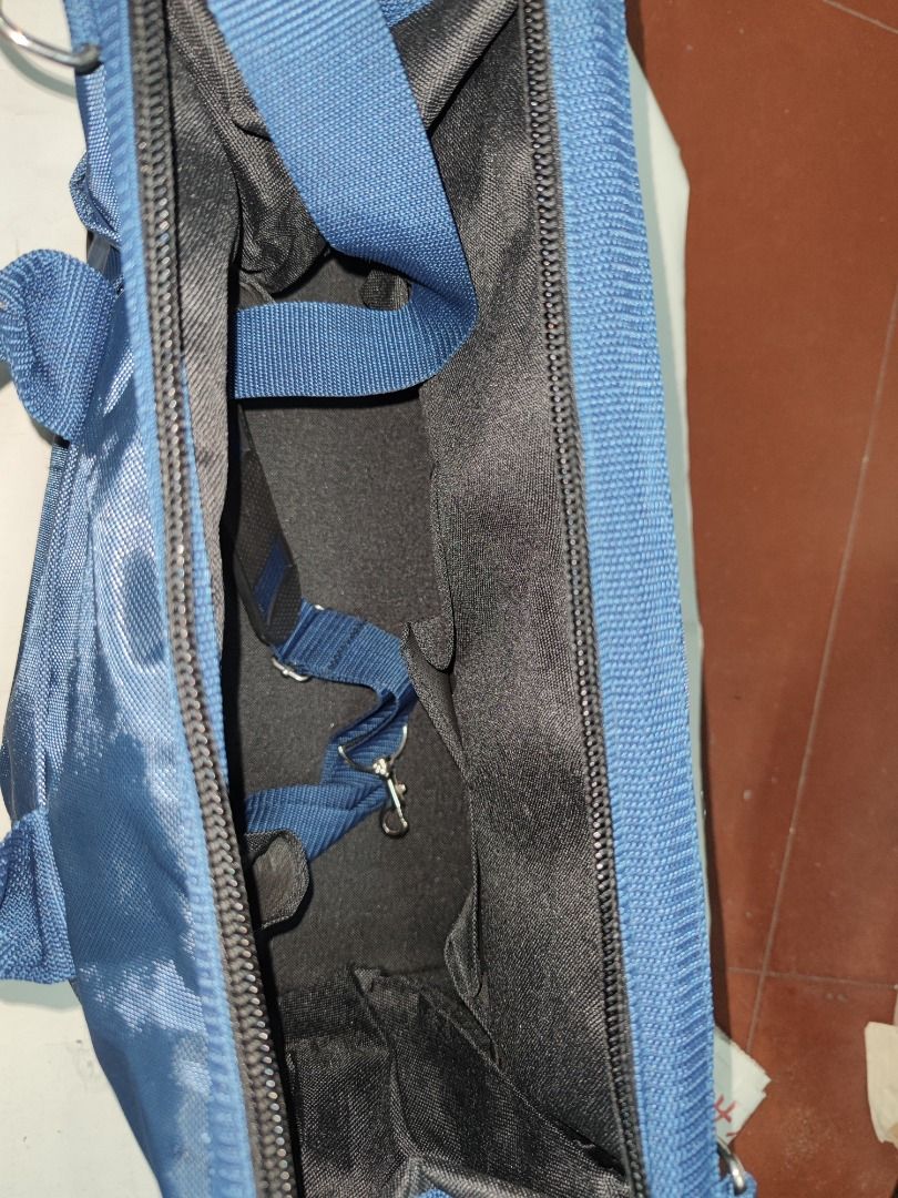 Tool Bag (Category: Construction Tools & Equipment) located in Manila. Submitted by kingkai999 (Listing ID 1330304421, Image 3). Description: A tool bag is a durable, often portable container used for storing and organizing various tools and equipment. It typically features multiple compartments, pockets, and dividers to keep tools neatly organized and easily accessible for different tasks. Tool bags come in various sizes, materials, and designs 
