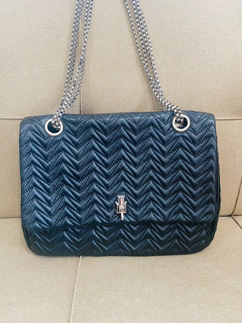 Authentic/ Pre-owned LANVIN Leather Flap Bag (Category: Luxury Bags & Wallets) located in Lucena. Submitted by madame_bagelia_collection (Listing ID 1330369126, Image 1). Description: Authentic & Preloved Rank B , lightly used but looks new Metal chain strap, convertible to shoulder & crossbody. Silver tone hardware Medium size (Practical size) Dimensions: Length 29cm, Height 22cm, Width 8cm Free Shipping 🎁🚛.