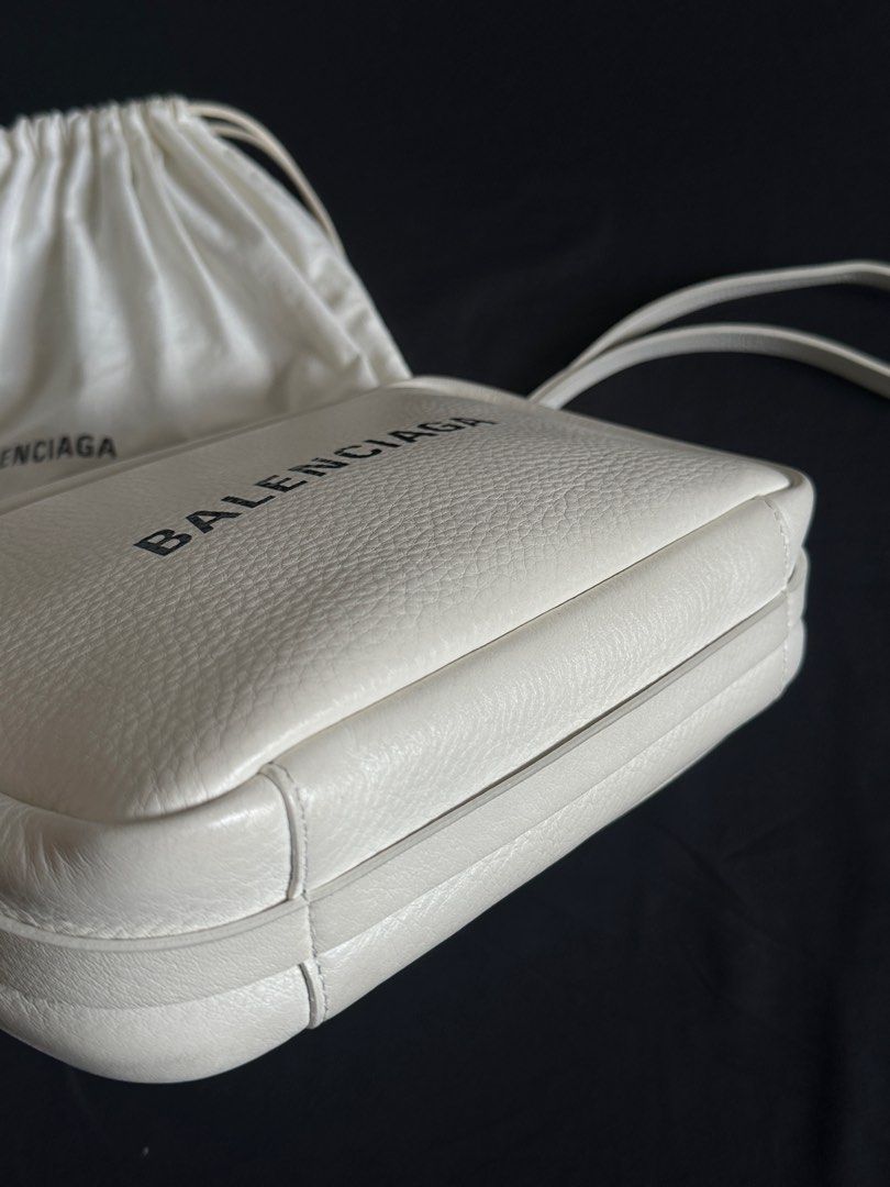 Balenciaga Camera Bag (Category: Luxury Bags & Wallets) located in Rizal. Submitted by jaytee. (Listing ID 1330439251, Image 3). Description: - Balenciaga Everyday Camera Bag (Small) - 9/10 condition - Clean white leather - Comes with dustbag and tags - RFS decluttering.