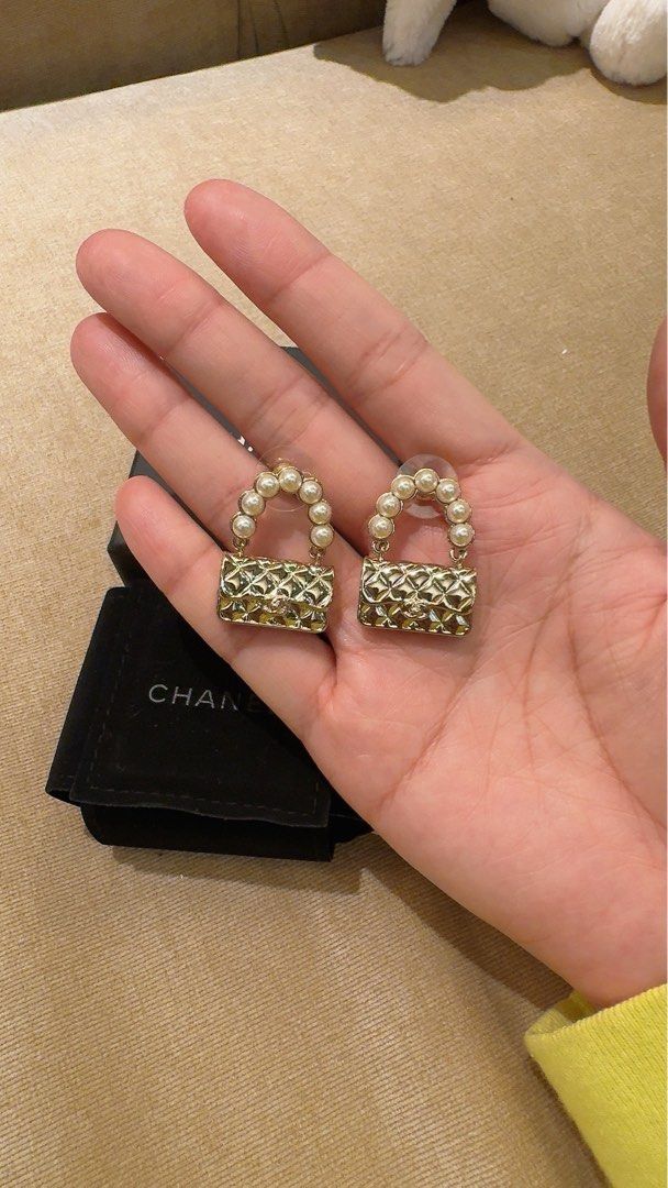 Chanel cf pearl earrings (Category: Earrings) located in Manila. Submitted by joanna328 (Listing ID 1330378778, Image 3). Description: brand new with box, very limited and no more in production Bought in hongkong Personal items, not reseller All photos are taken by myself. please do not use without permission.