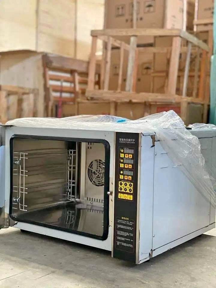COMMERCIAL CONVECTION OVEN WITH 4 PANS (Category: Ovens & Toasters) located in Taguig. Submitted by mgracelim38484 (Listing ID 1330366013, Image 2). Description: SPECIFICATIONS: -4 Pan tray included -Intelligent hot air circulation furnace -Double fan -Power: 4200W -Voltage: 220v -Net weight: 58Kg -Dimensions: 710*605*510 (mm) -Thick stainless steel -Warming faster -Heat evenly -Transparent glass window -Handle anti-scald -Timing and temperature 