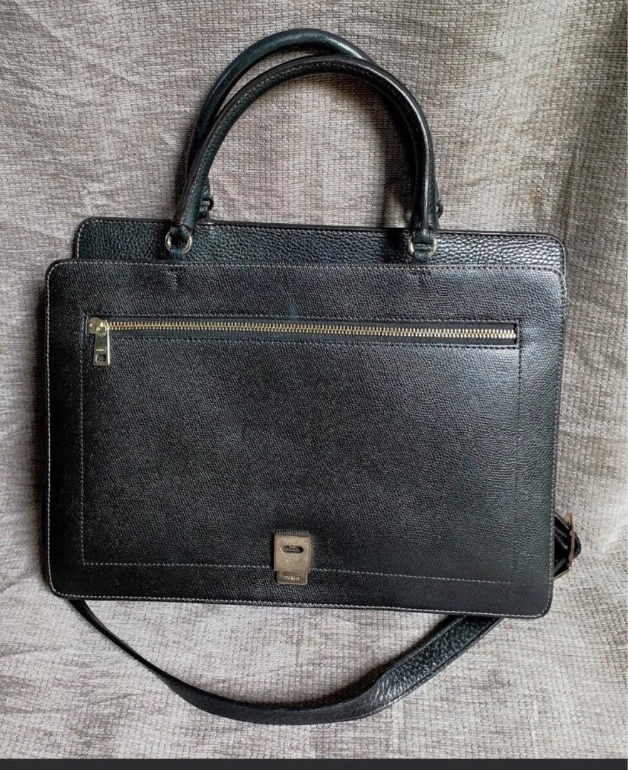 Furla black bag (Category: Luxury Bags & Wallets) located in Quezon City. Submitted by skoom (Listing ID 1330353882, Image 1). Description: Has signs of usage but still beautiful and functional. Last price.