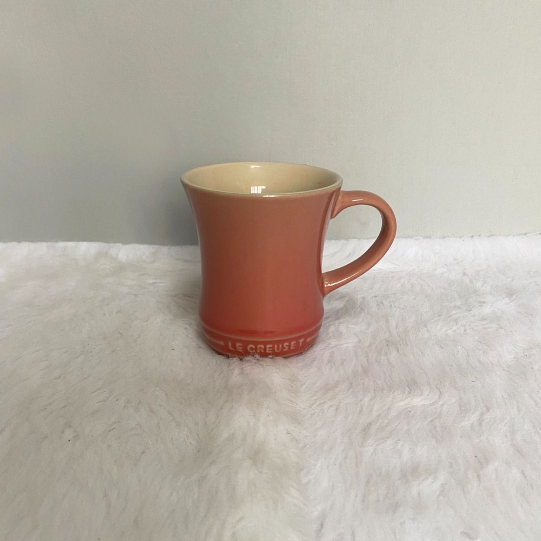 Le Creuset Rose Pink Stoneware Mug Cup (Category: Coffee & Tea Tableware) located in Consolacion. Submitted by posh_avenue_home (Listing ID 1330356781, Image 1). Description: In very good condition. From Japan. 4" x 3.5". 100% authentic!!!.