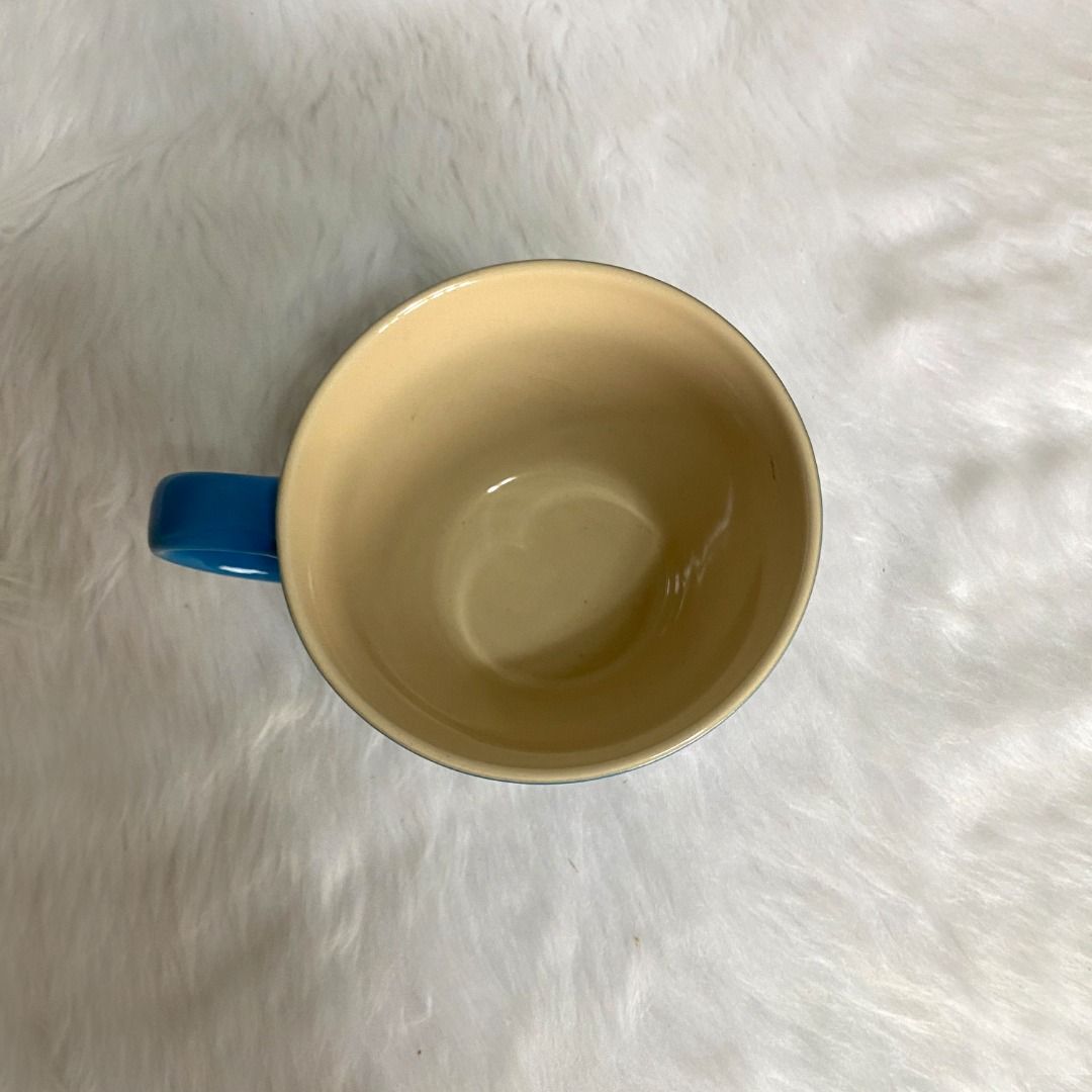 Le Creuset Stoneware Bistro Mug (Category: Coffee & Tea Tableware) located in Consolacion. Submitted by posh_avenue_home (Listing ID 1330357026, Image 2). Description: In very good condition. From Japan. 3.5" x 4.5". 100% authentic!!!.