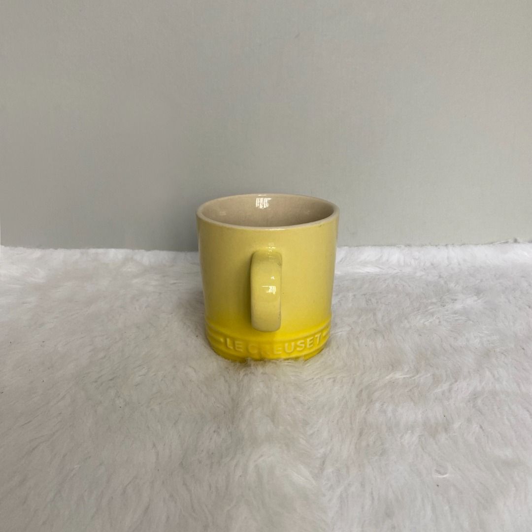 Le Creuset Yellow Stoneware Cup Mug (Category: Coffee & Tea Tableware) located in Consolacion. Submitted by posh_avenue_home (Listing ID 1330357266, Image 2). Description: In very good condition. From Japan. 3.75" x 3.5"..