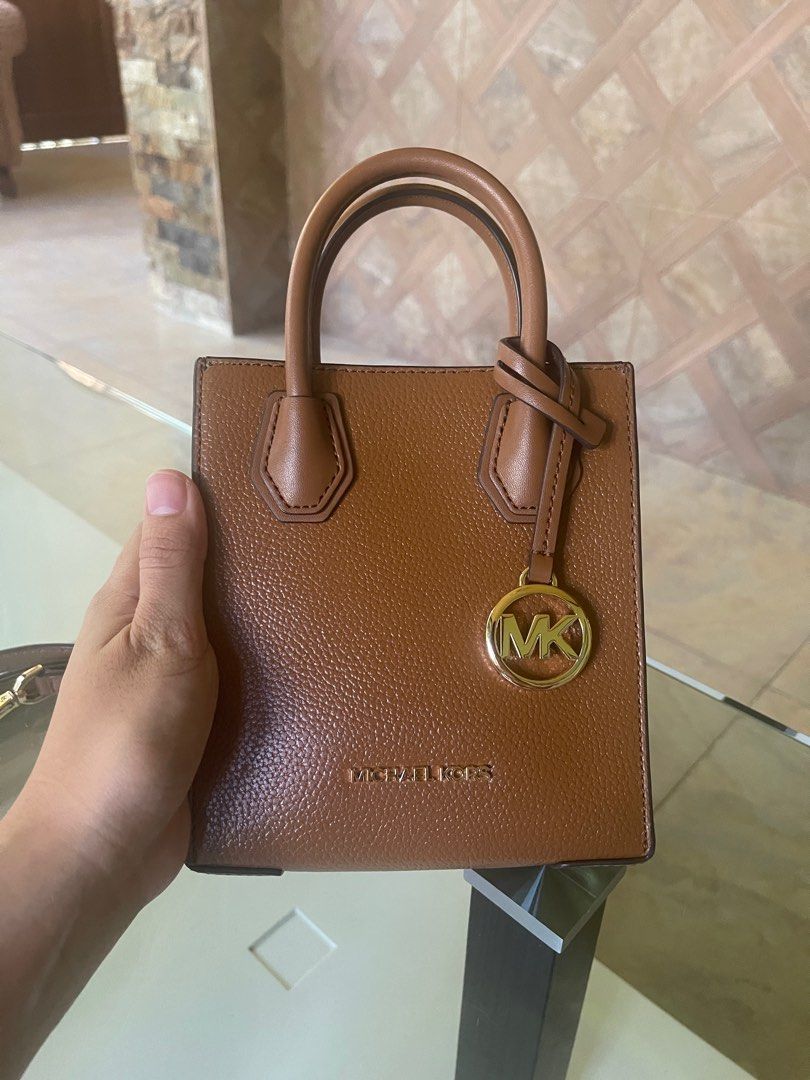 Michael Kors Mercer Bag - XS (Category: Cross-body Bags) located in Cavite. Submitted by ceejayde (Listing ID 1330386747, Image 2). Description: MK MERCER BAG XS size Used twice, with tag Last price posted Brand new-like quality so no haggling please RFS: Too many bags.