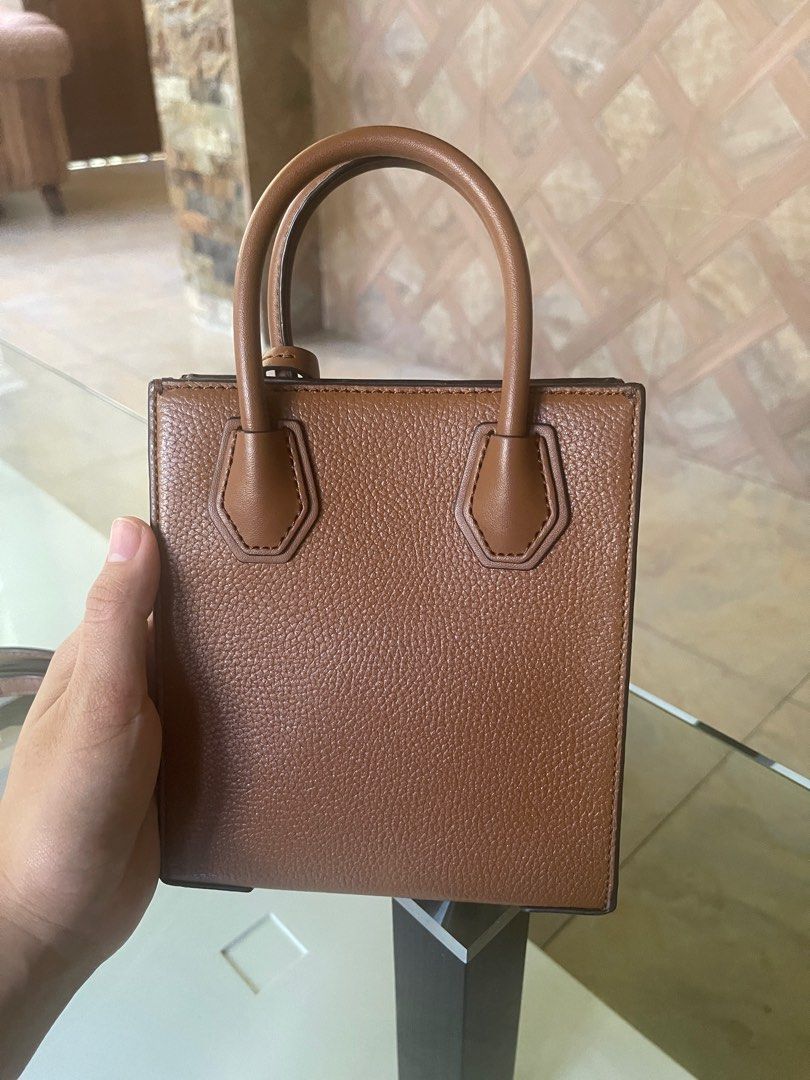 Michael Kors Mercer Bag - XS (Category: Cross-body Bags) located in Cavite. Submitted by ceejayde (Listing ID 1330386747, Image 3). Description: MK MERCER BAG XS size Used twice, with tag Last price posted Brand new-like quality so no haggling please RFS: Too many bags.