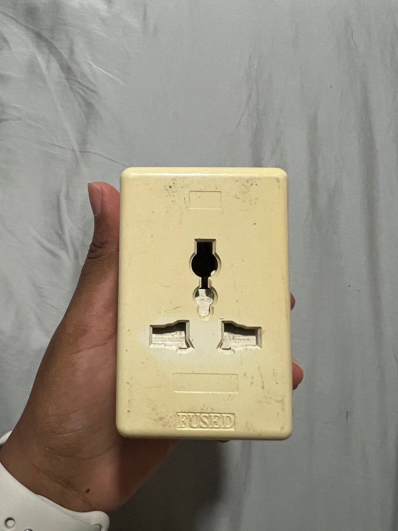 Multi extension plug (Category: Other Accessories) located in Singapore. Submitted by pettycloset (Listing ID 1330348010, Image 1). Description: Discolouration from storage. Works well (tested 12 oct 2024). .