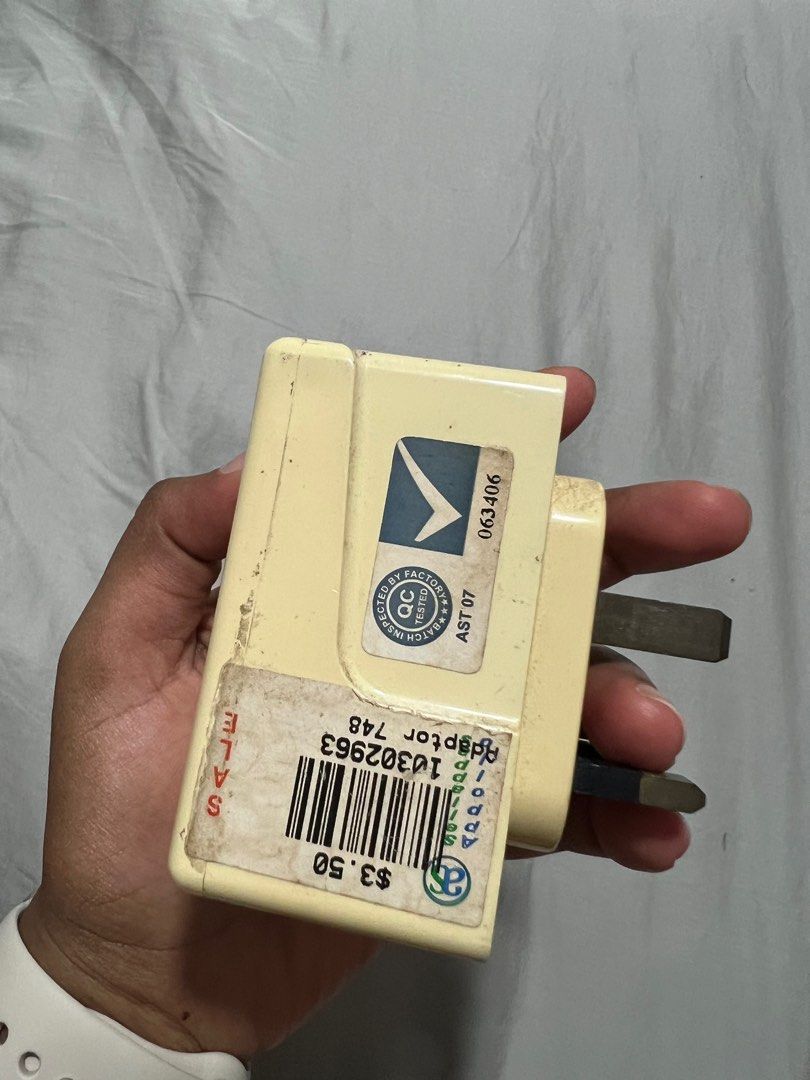 Multi extension plug (Category: Other Accessories) located in Singapore. Submitted by pettycloset (Listing ID 1330348010, Image 2). Description: Discolouration from storage. Works well (tested 12 oct 2024). .