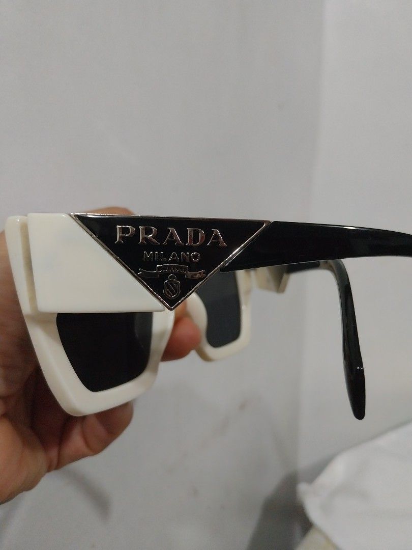 PRADA (Category: Sunglasses & Eyewear) located in Quezon City. Submitted by jonvee2000 (Listing ID 1330443445, Image 3). Description: Preloved bought in HK lightly used.