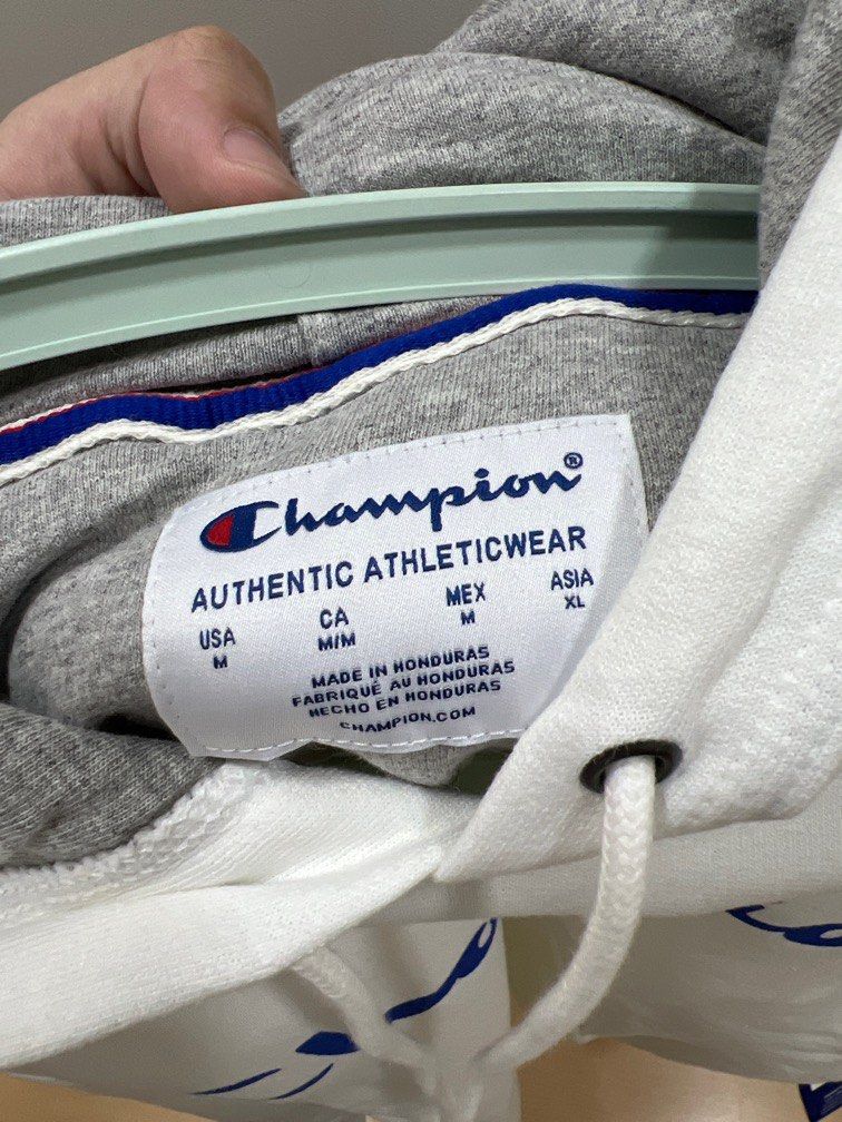 White Champion Hoodie (Category: Coats, Jackets and Outerwear) located in Manila. Submitted by ooks_ (Listing ID 1330436695, Image 3). Description: White Champion Hoodie from the US - Never worn, just stored. - US Medium, but can fit an Asian Large IMO. - No flaws, really good condition..
