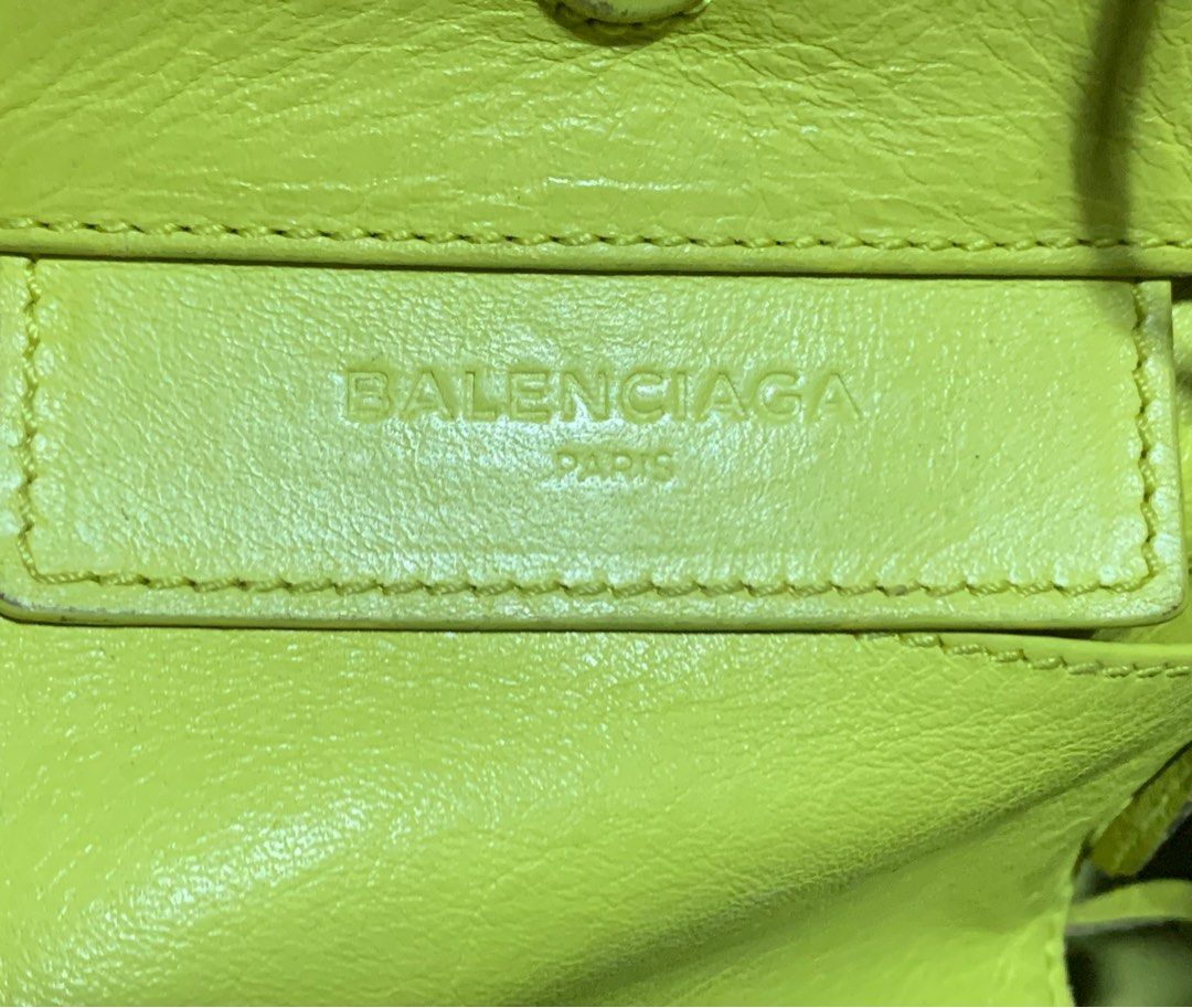 Authentic Balenciaga Papier A4 Mini Bag (Category: Luxury Bags & Wallets) located in Rosario. Submitted by myvinatgepieces (Listing ID 1330635602, Image 3). Description: Authentic Balenciaga Papier A4 Mini Shoulder Bag Normal signs of wear Body- very good used condition Handles- cracks- undergone color restoration by professional bag restoration shop Measurements: 9” L x 3.5” W x 7” H Interior Pockets: One patch pocket Exterior Pockets: One front