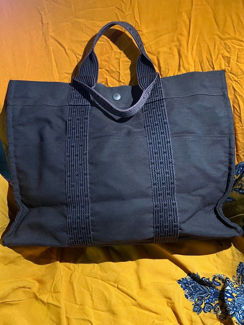 Hermes Herline Tote Bag (Category: Luxury Bags & Wallets) located in Pasay City. Submitted by damoreluxe (Listing ID 1330603978, Image 2). Description: Hermes Herline Tote Bag This is my personal preloved that I bought in Japan. Need some oil to soften the zipper, no rubs on canvas and has a big compartment. You can use it as a laptop/document bag or a travel bag..