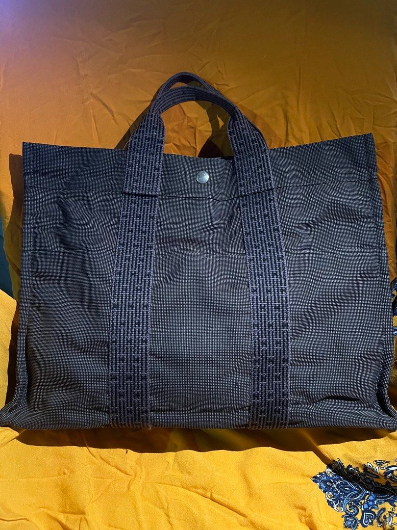 Hermes Herline Tote Bag (Category: Luxury Bags & Wallets) located in Pasay City. Submitted by damoreluxe (Listing ID 1330603978, Image 1). Description: Hermes Herline Tote Bag This is my personal preloved that I bought in Japan. Need some oil to soften the zipper, no rubs on canvas and has a big compartment. You can use it as a laptop/document bag or a travel bag..