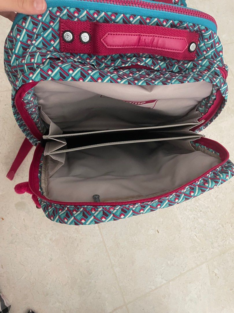 Kipling Backpack (Category: Backpacks) located in Singapore. Submitted by norahwier41845 (Listing ID 1330525182, Image 3). Description: Lots of compartments Laptop compartment Big Almost never used Kipling brand Retail price 200.