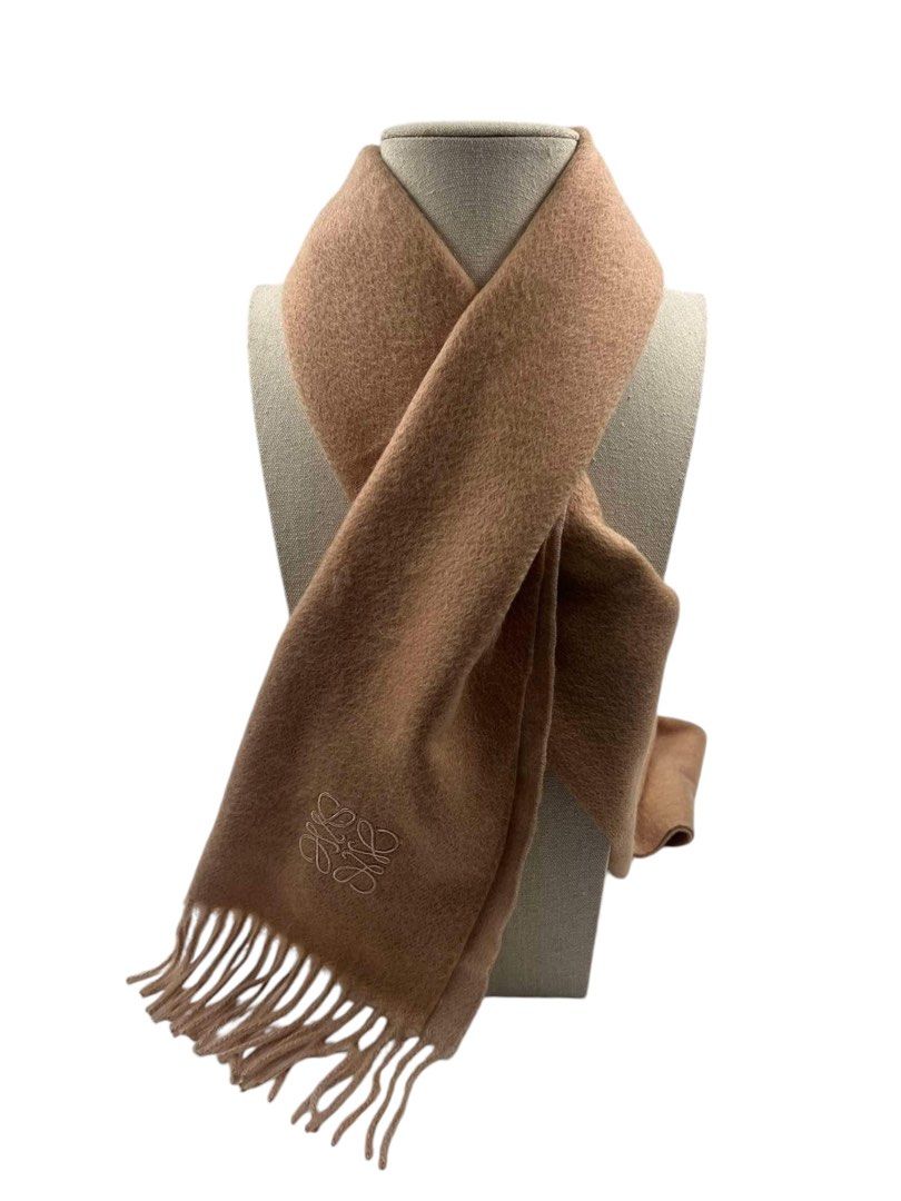 ⚜️Loewe Classic Scarf (Category: Luxury Accessories) located in Makati City. Submitted by 90sangel (Listing ID 1330540243, Image 3). Description: •Item: Loewe Classic Scarf in brown/beige 🤎⚜️✨ Scarf crafted in medium-weigth double face wool and cashmere blend. •Size: 28cm x 180cm Bicolor double-sided / Fringed edges Anagram embroidery placed on the corner ~ for the love of neutrals 🤎.
