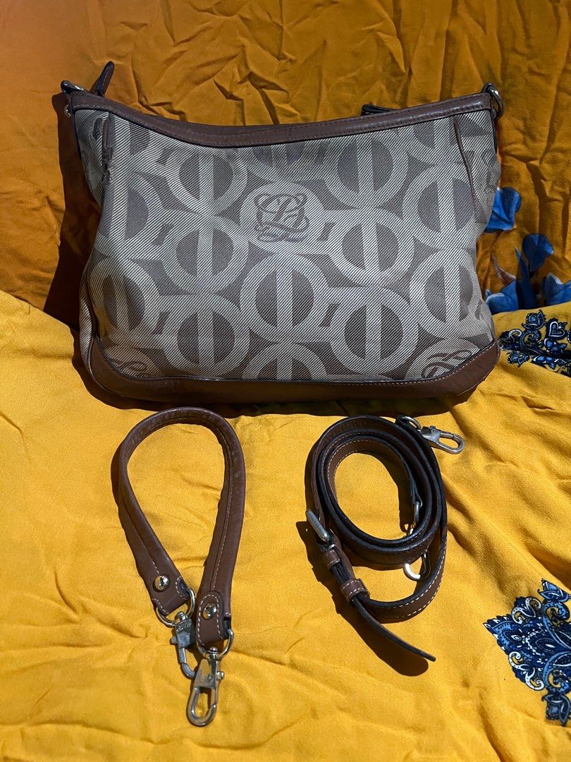 Louis Quatorze 2 way bag (Category: Luxury Bags & Wallets) located in Pasay City. Submitted by damoreluxe (Listing ID 1330622523, Image 2). Description: Louis Quatorze 2 way bag Have rubs as shown on the pictures. Tarnished hardware but does affect the use of this bag..
