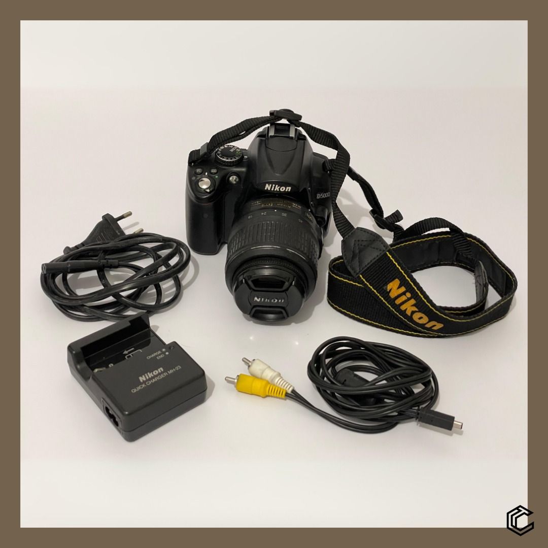 Nikon D5000 DSLR Camera (Category: Cameras) located in Bacoor. Submitted by box_of_randoms (Listing ID 1330617970, Image 1). Description: Specification: -Nikon D5000 Key Features -12.9 megapixel DX-format CMOS sensor (effective pixels: 12.3 million) -2.7" tilt and swivel LCD monitor (230,000 dots) -Movie capture at up to 1280 x 720 (720p) 24 fps with mono sound -Live View with contrast-detect AF, face detection and subject tracking -Image sensor 