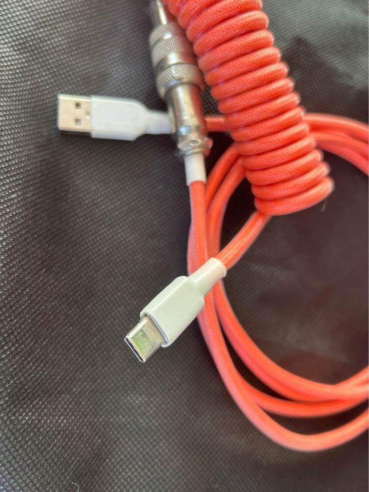 Orange Custom Coiled Keyboard Cable (Category: Computer Keyboard) located in Santa Rosa. Submitted by gondola88 (Listing ID 1330656639, Image 2). Description: .