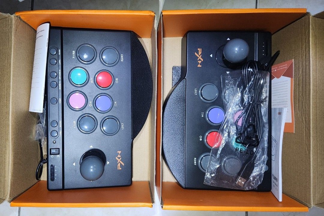 PXN 0082 Gamepad Arcade Wired Joystick (Category: Controllers) located in Dasmarinas. Submitted by bravo_xchange (Listing ID 1330610741, Image 3). Description: TWO joysticks that were opened but never played with after the initial setup. MINT condition, barely even played once. I bought them as a gift for my 9-year-old son, but he preferred the PS4 controllers. Brand new cost P2,300, and they have just been in the boxes..