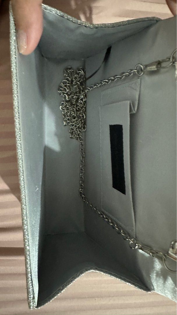 Silver bag/clutch - Jessica McClintock (Category: Clutches) located in Manila. Submitted by cltrrd (Listing ID 1330645035, Image 3). Description: Used once Like new Bought from Rustan’s for 1850.