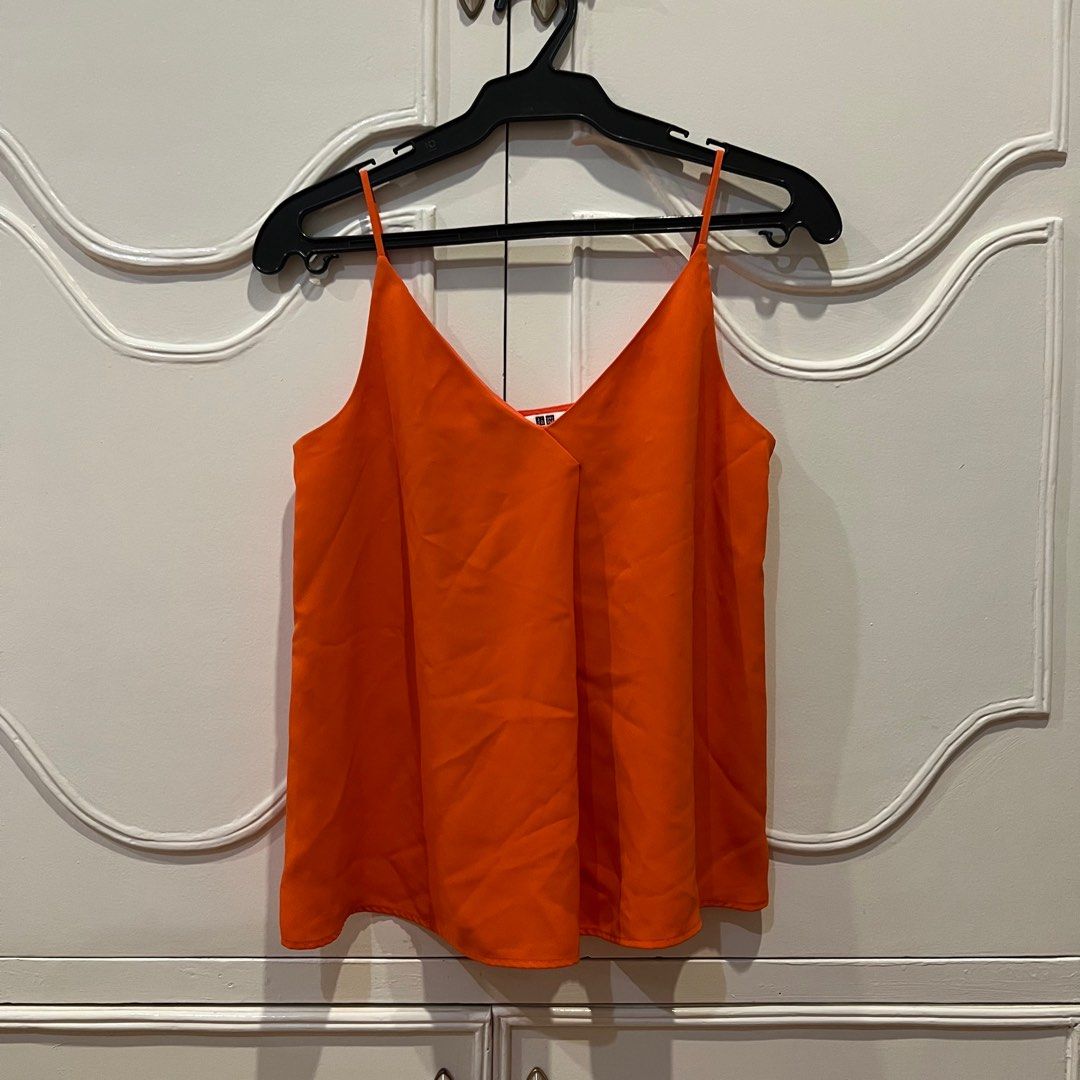 Uniqlo orange sleeveless top (Category: Sleeveless) located in Paranaque City. Submitted by maggiedc (Listing ID 1330643499, Image 1). Description: Uniqlo orange sleeveless top 🏷️ ₱200 + shipping fee ➼ 10/10 condition ➼ Brand: Uniqlo ➼ Size S on tag, fits XS-S frames ➼ Flowy fabric MOP: gcash or bank transfer MOD: grab/lalamove or ggx/lbc (sf to be shouldered by buyer) all sales are final, no return, refund, or exchange!.