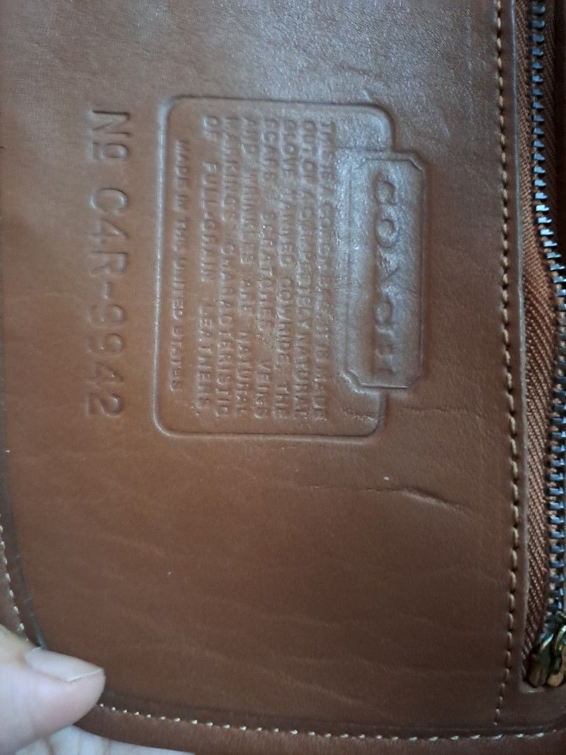 Vintage Coach 9942 Carousel Bag (Category: Shoulder Bags) located in Batangas. Submitted by decluterring_tita (Listing ID 1330572970, Image 3). Description: Vintage Coach 9942 Carousel Bag Used (normal wear), Super chic hand held! , British tan thick glove tanned leather, top handle, solid brass hardware, zipper closure, interior zipper. W24cm x H21cm x D11cm Bag charms not included.