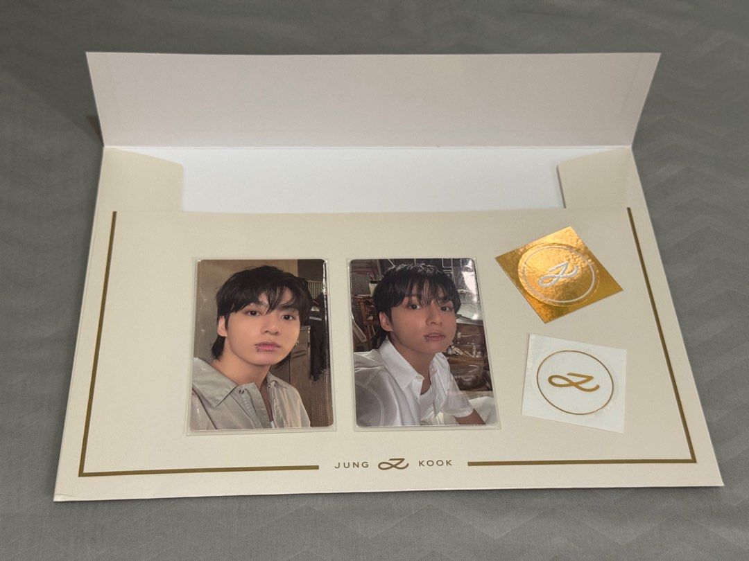 Full inclusions - BTS Jung Kook Golden Album Solid Version (Unsealed) (Category: K-Wave Merchandise) located in Makati City. Submitted by abengers (Listing ID 1330720024, Image 2). Description: 800 + LSF Onhand and ready to ship Inclusions: - 2 photocards (see 2nd photo) - 2 album postcards (see 3rd photo) - 1 album poster (see 4th photo) - 2 symbol stickers - Book case - Photobook - CD and CD envelope - Contents envelope RFS: Decluttering.