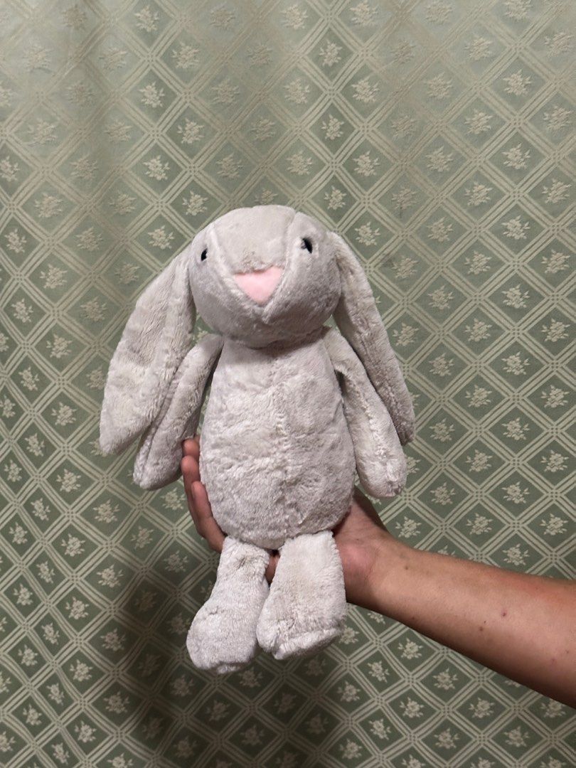(READ DESCRIPTION) Gray jellycat bunny rabbit stuffed toy plush (Category: Plushies & Soft Toys) located in San Jose. Submitted by lexeepy (Listing ID 1328347714, Image 2). Description: -Has paper tag but no etiketa. -unsure about authenticity but perfect dupe -X sensitive 💵Mode of payment: Gcash 🚚Courier: J&T 📦Prio Payo 🔖3 days reservation 📍location: San Jose, Antique ❗️Will only entertain offers of current price or higher❗️ .