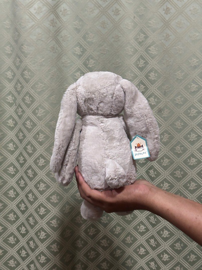 (READ DESCRIPTION) Gray jellycat bunny rabbit stuffed toy plush (Category: Plushies & Soft Toys) located in San Jose. Submitted by lexeepy (Listing ID 1328347714, Image 3). Description: -Has paper tag but no etiketa. -unsure about authenticity but perfect dupe -X sensitive 💵Mode of payment: Gcash 🚚Courier: J&T 📦Prio Payo 🔖3 days reservation 📍location: San Jose, Antique ❗️Will only entertain offers of current price or higher❗️ .