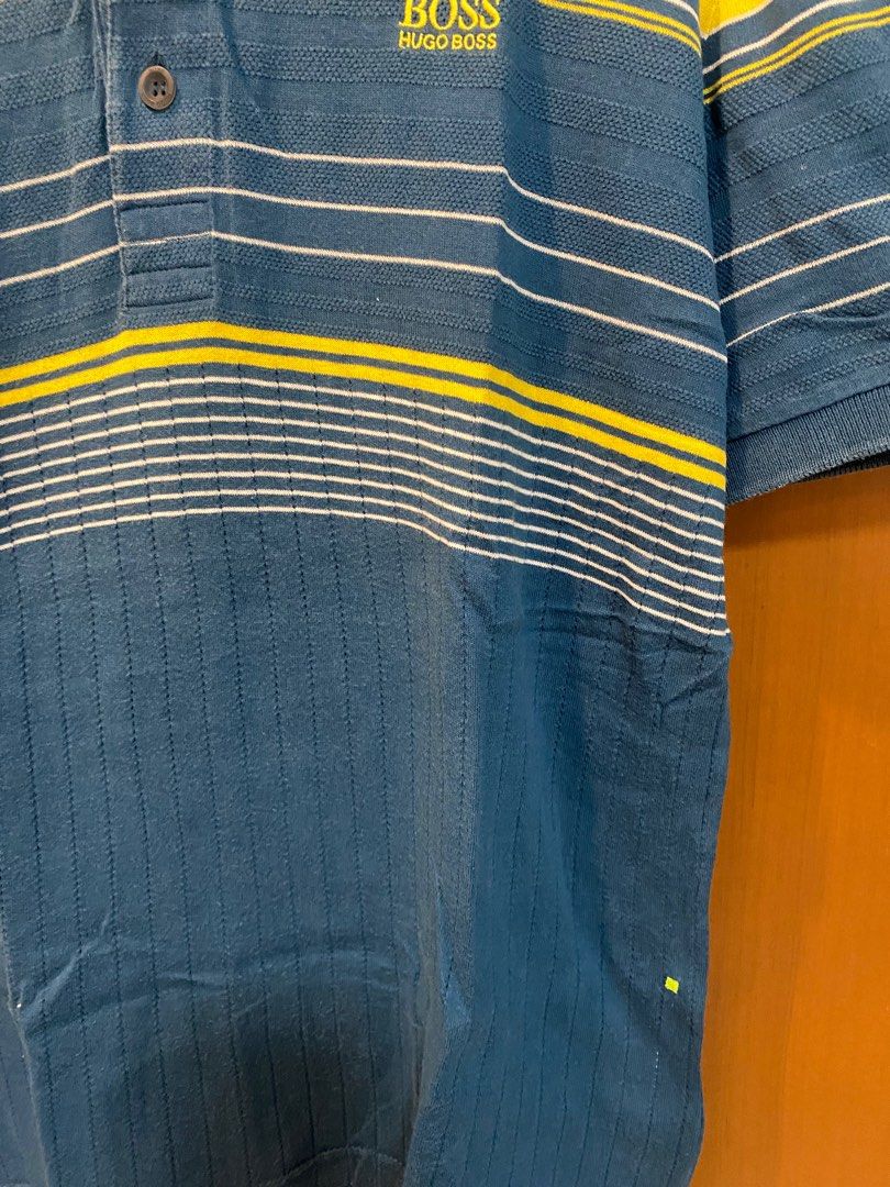 Hugo Boss Polo Shirt (Category: Tshirts & Polo Shirts ) located in Panabo. Submitted by jesrielle (Listing ID 1330860208, Image 3). Description: Made in Portugal Large but fit to Medium 19x26.5 Good condition Color may vary due to lighting .