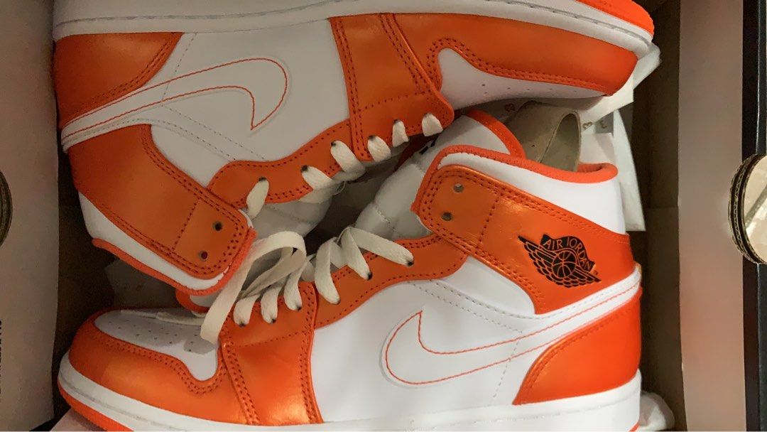 Orange jordan 1s 2025