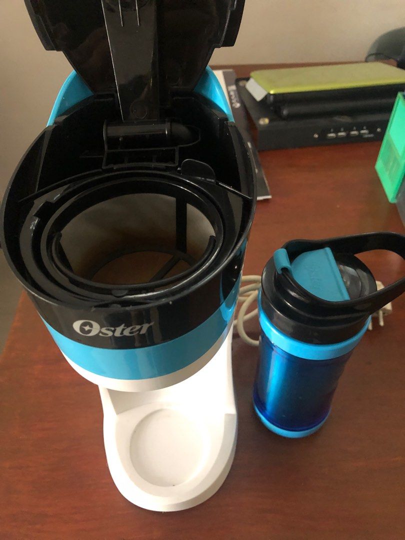 Oster My Brew Coffee Maker (Category: Coffee Machines & Makers) located in Manila. Submitted by summerkissmnl (Listing ID 1330725880, Image 2). Description: Panay qc ave location. Ready to go tumbler included. Good for on the go person that loves coffee! 👌🏻🥰🤙🏻 Note: need repair on the button. Stock lang sya sa on kaya dapat remove sa plug pag di na ginagamit No box. .
