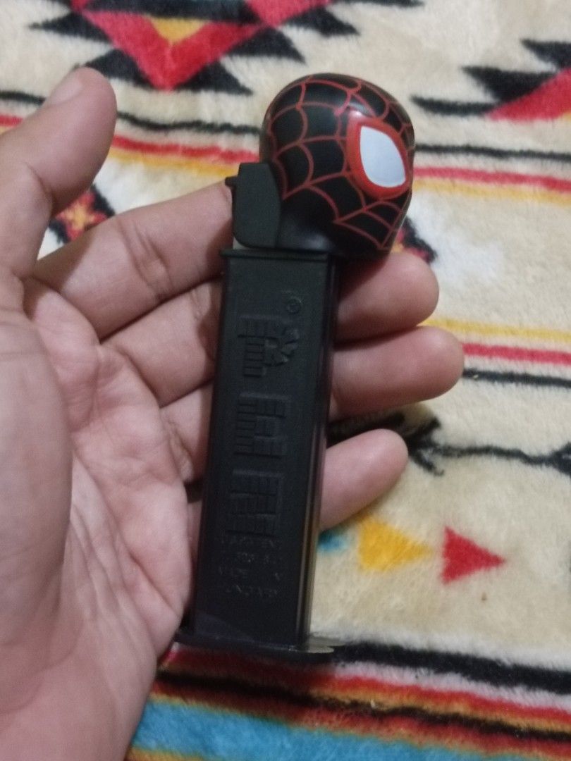 PEZ miles morales spiderman (Category: Figurines & Statues) located in Quezon City. Submitted by markgolveo (Listing ID 1330800258, Image 1). Description: PEZ miles morales spiderman.