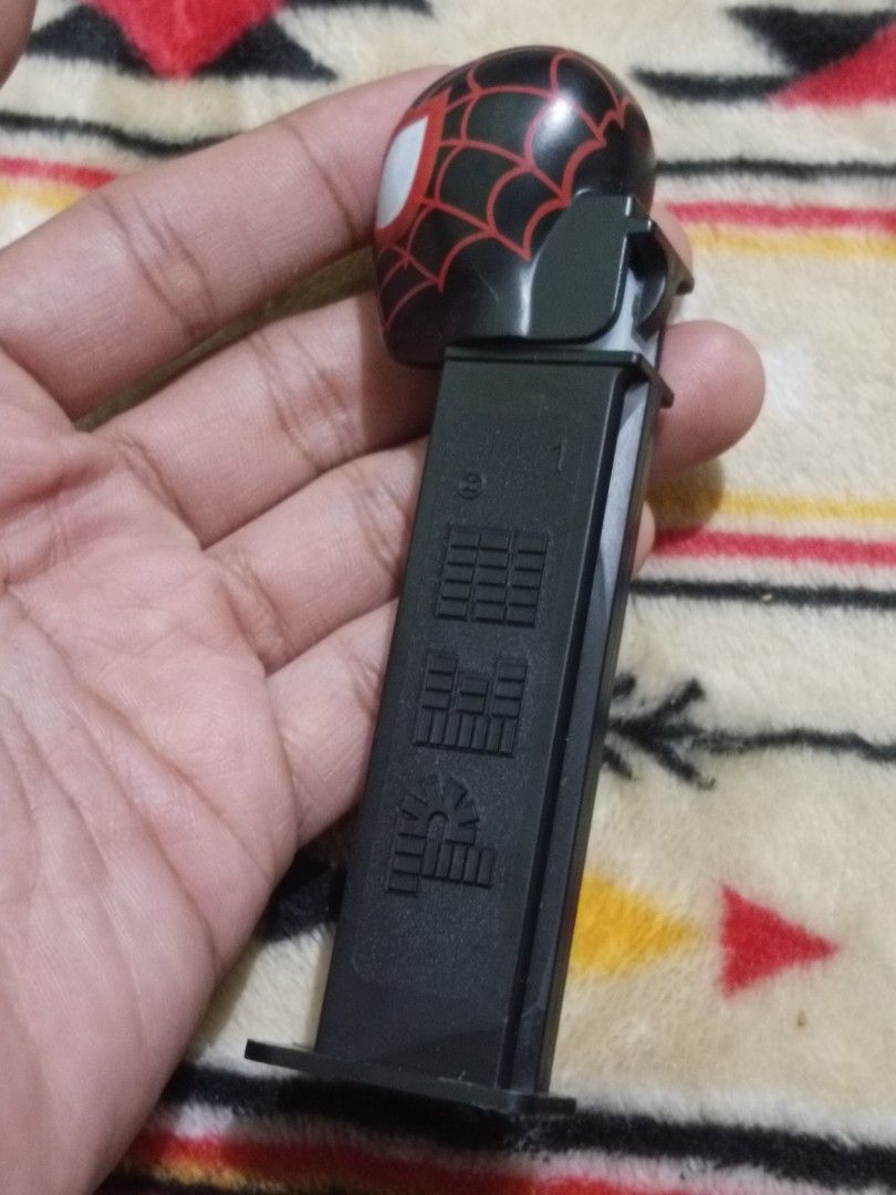 PEZ miles morales spiderman (Category: Figurines & Statues) located in Quezon City. Submitted by markgolveo (Listing ID 1330800258, Image 3). Description: PEZ miles morales spiderman.