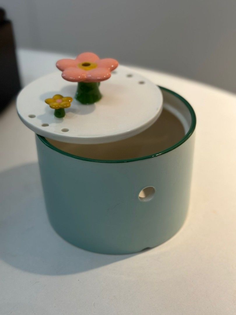 Porcelain Flower Pet Water Fountain (Category: Homes & Other Pet Accessories) located in Singapore. Submitted by petsgalaxysg (Listing ID 1330720066, Image 1). Description: brand new in box! choose your favourite designs and colours! we have blue and green available! want to view before purchasing? drop us a text or pm us before heading down to our shop ! opt for delivery or self-collect :) click into our profile for more information! get 10% off