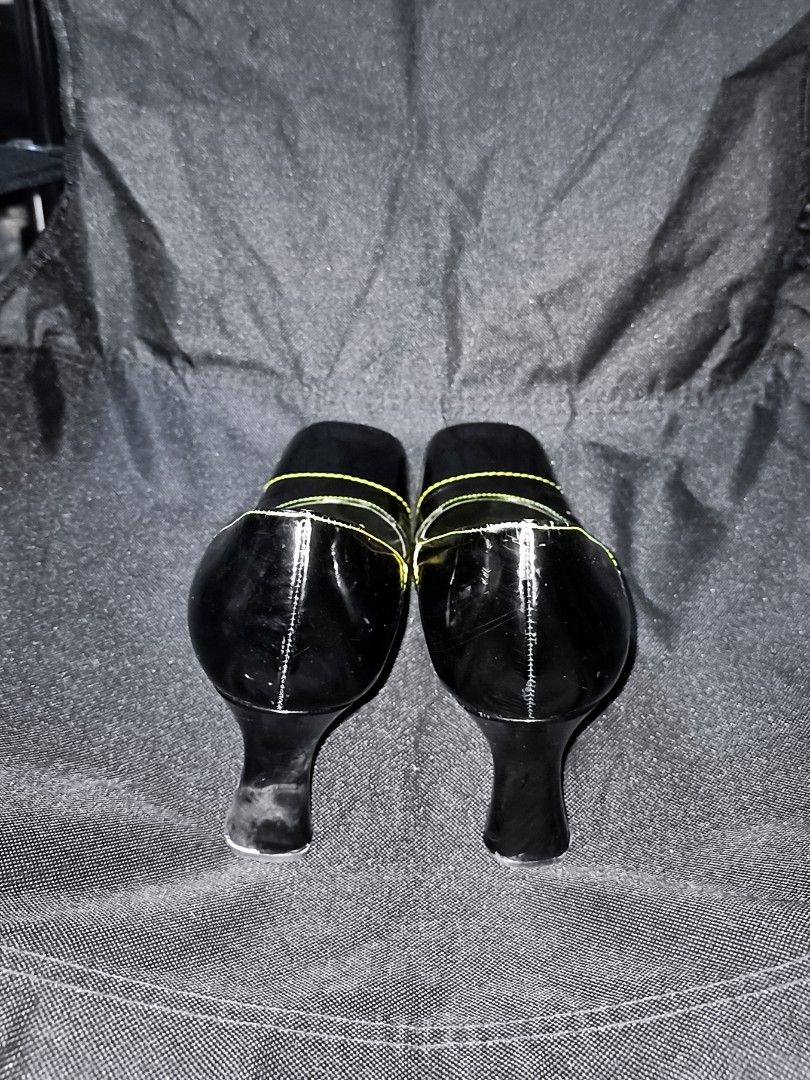 PRADA Black Leather Square Toe Cuban Heel Lackleder Pumps (Category: Heels) located in Baguio. Submitted by sapovnela (Listing ID 1330865182, Image 3). Description: +sf for the markings/current state/appearance/character/design/theme please check photos, z👁️‍🗨️👁️‍🗨️m all Ü want, as i do my best to show everything in the pictures color/s: black fabric/material: patent leather, yellow stitching detail featured style: retro vintage, comfort slip
