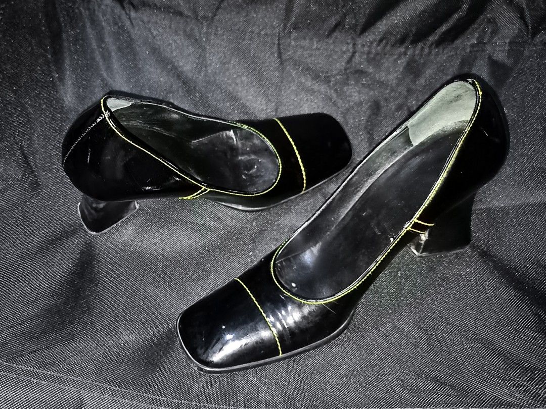 PRADA Black Leather Square Toe Cuban Heel Lackleder Pumps (Category: Heels) located in Baguio. Submitted by sapovnela (Listing ID 1330865182, Image 2). Description: +sf for the markings/current state/appearance/character/design/theme please check photos, z👁️‍🗨️👁️‍🗨️m all Ü want, as i do my best to show everything in the pictures color/s: black fabric/material: patent leather, yellow stitching detail featured style: retro vintage, comfort slip