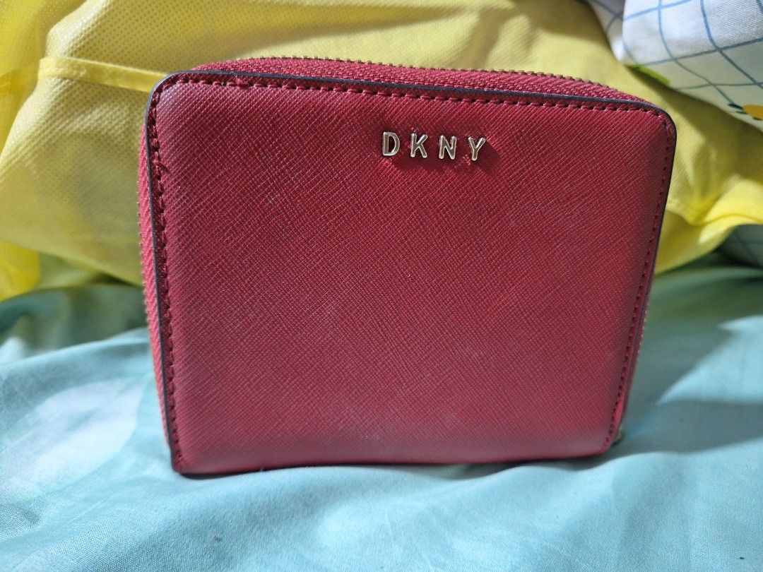 Pre-loved DKNY Wallet (Category: Luxury Bags & Wallets) located in Iloilo. Submitted by Exhale_Fashion (Listing ID 1330790104, Image 1). Description: Pre-loved DKNY Wallet with card holder Red color Saffiano leather Intact rubber lining Negotiable just message me.