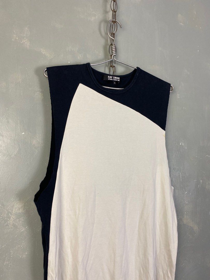 Raf Simons SS07 Color-blocked Tank Top (Category: Tshirts & Polo Shirts ) located in Manila. Submitted by insidethreads_ (Listing ID 1330778002, Image 3). Description: Tagged size: 48 (Fits S-M) Measurements (Inches) Width: 19 Length: 29.5 Sleeves: 14.5 Shoulder: 13 Condition: 8.5/10 Made in: Turkey Material: 100% Cotton.