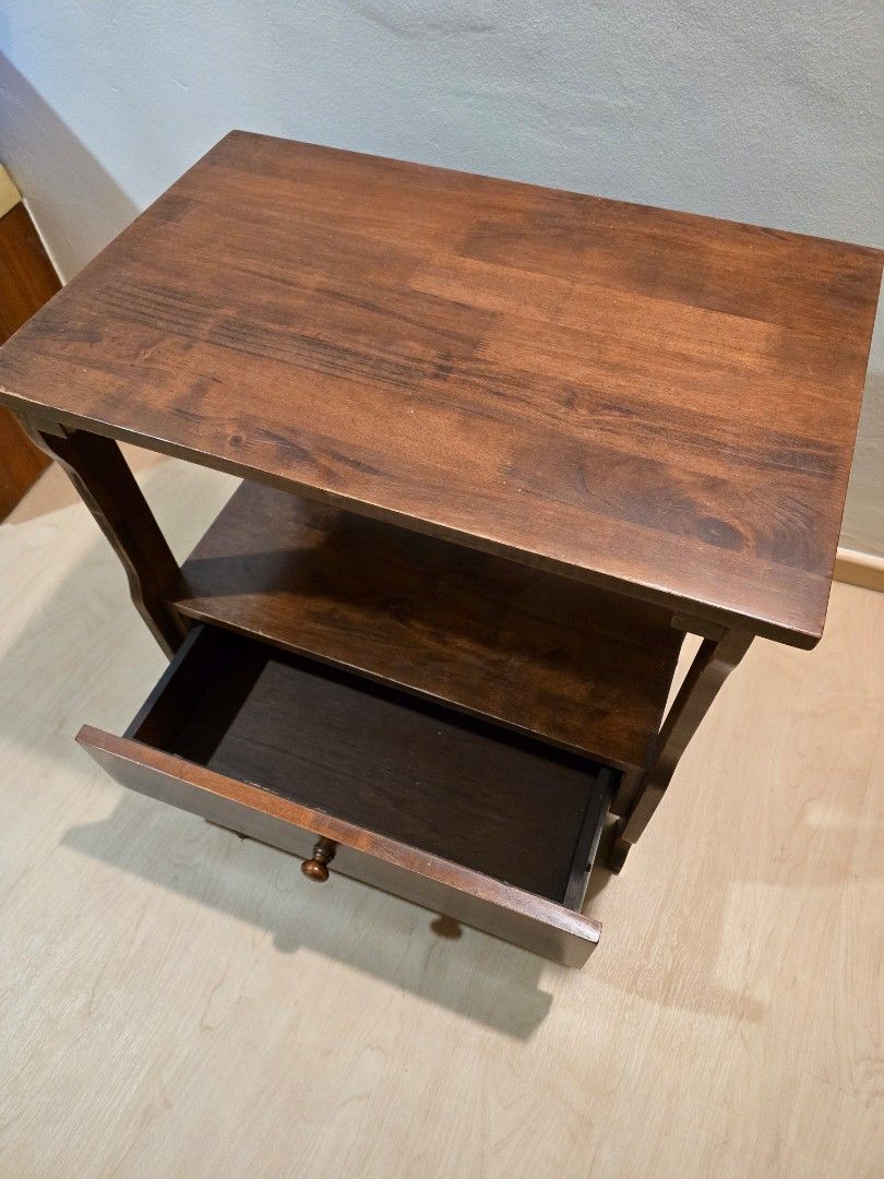 Solid wood side table (Category: Other Home Furniture) located in Singapore. Submitted by syhdznl (Listing ID 1330871301, Image 2). Description: L: 70cm W: 45cm H: 62cm.
