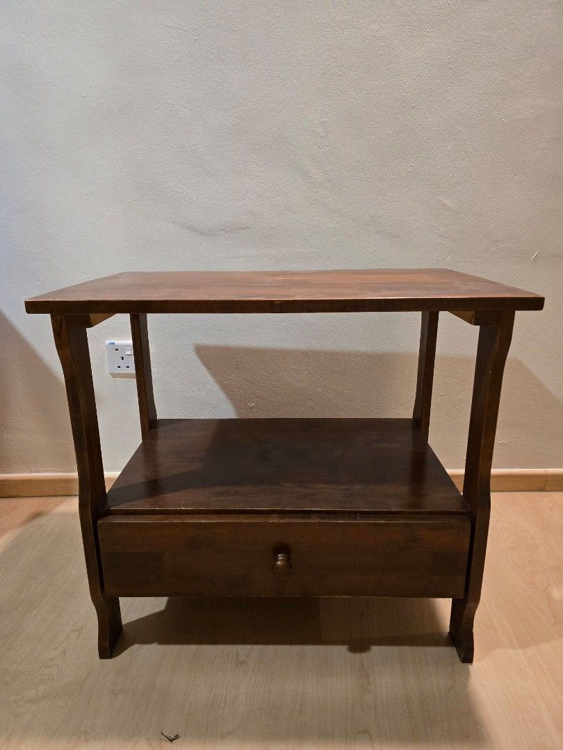 Solid wood side table (Category: Other Home Furniture) located in Singapore. Submitted by syhdznl (Listing ID 1330871301, Image 1). Description: L: 70cm W: 45cm H: 62cm.