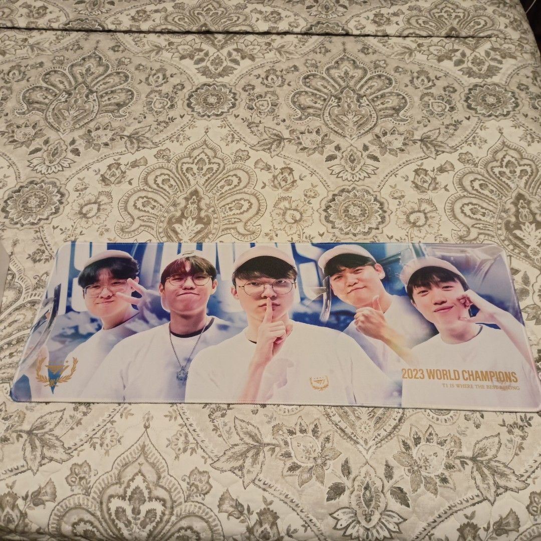 T1 mousepad (Category: Mouse & Mousepads) located in Cebu City. Submitted by korichan72 (Listing ID 1330798224, Image 2). Description: 2023 World Champions T1 desk mat. used it for a week, decided to sell because i prefer a larger mousepad. see pic for measurements..