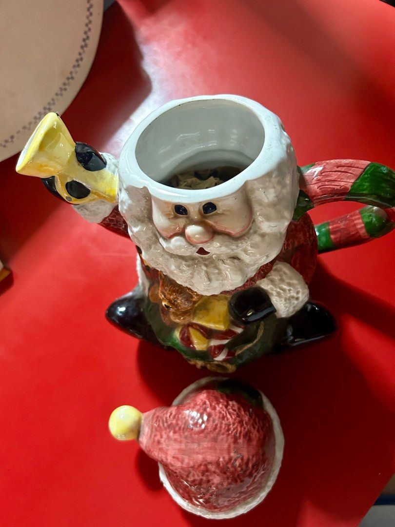 Wang’s International Santa Claus Tea Pot (Category: Coffee & Tea Tableware) located in Las Pinas. Submitted by rjmwings (Listing ID 1330776855, Image 2). Description: Wang’s International Santa Claus Tea Pot Vintage item from 1999, bought in the US 9-inches tall, made of ceramic material Used as Christmas decoration for the kitchen or dining area For the collectors of tea pots and Santa Claus figurines The item may have some signs of cosmetic wea