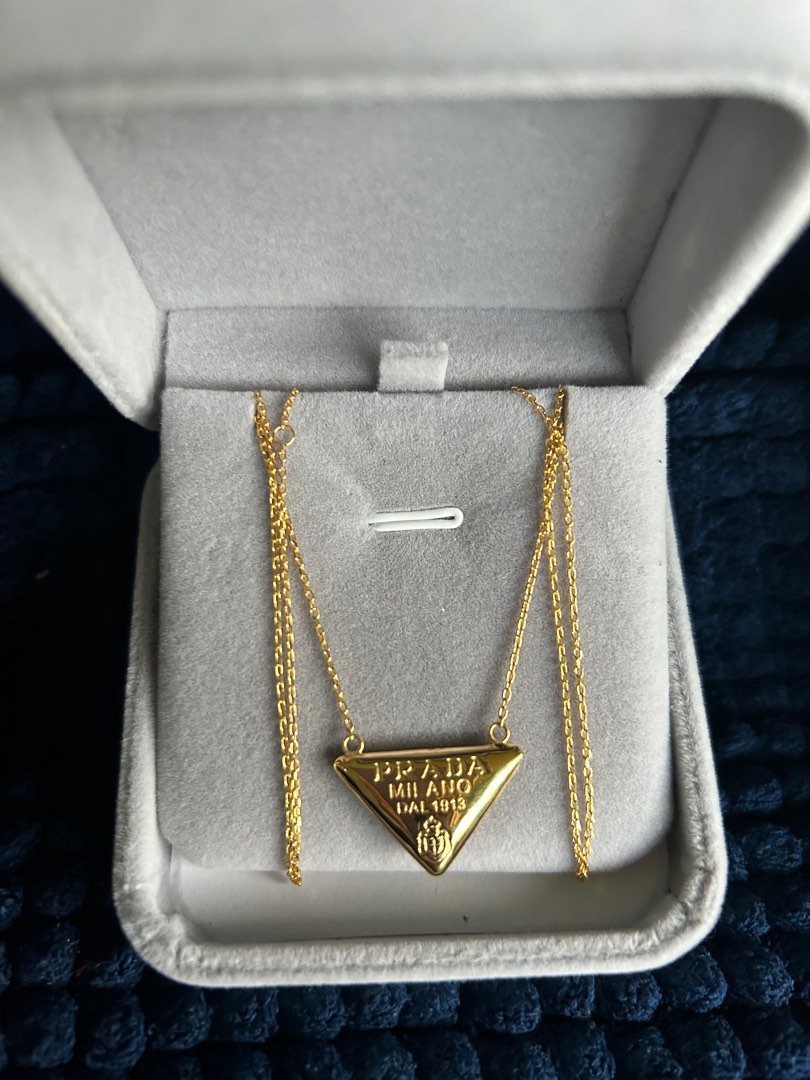 Gold prada necklace on sale