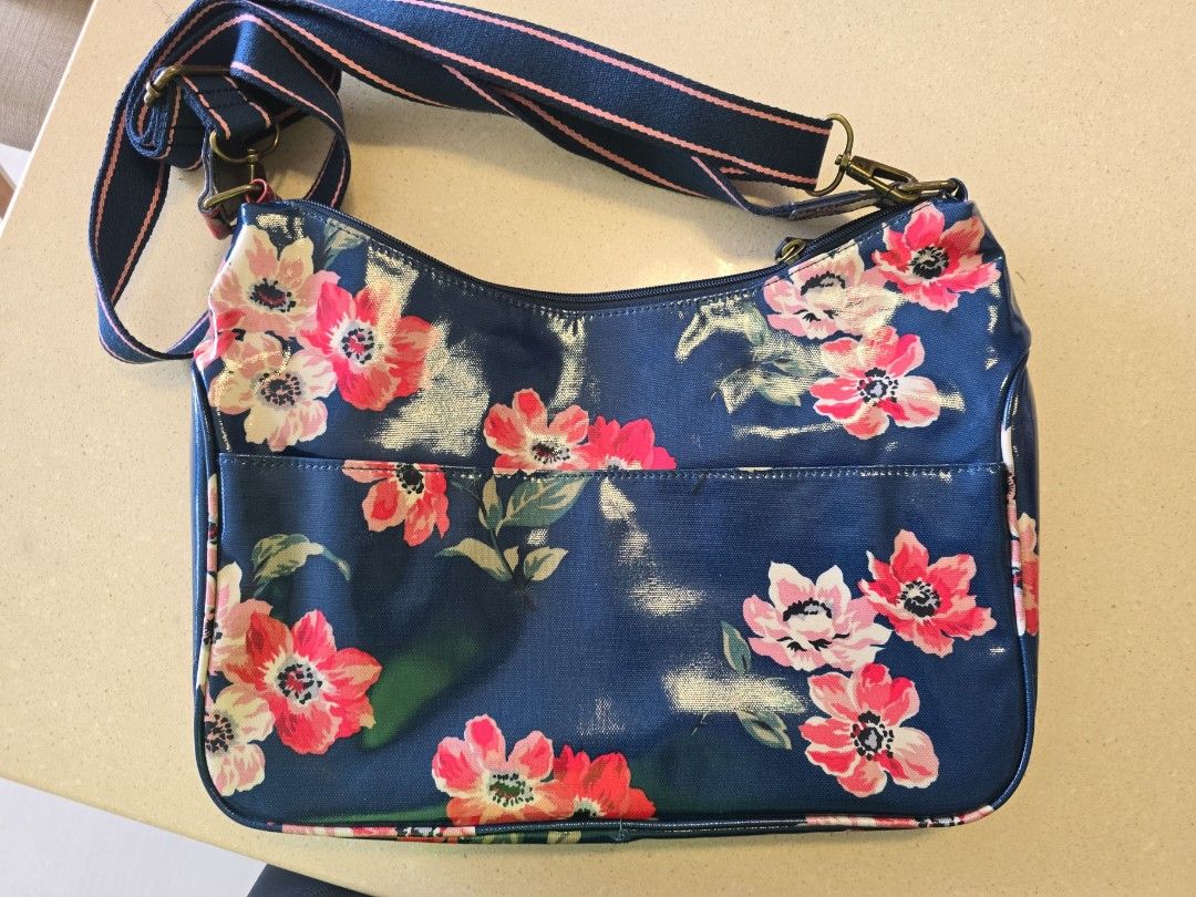 Authentic Cath Kidston Sling Bag used once as good as new. Selling for 120.negotiable for fast price