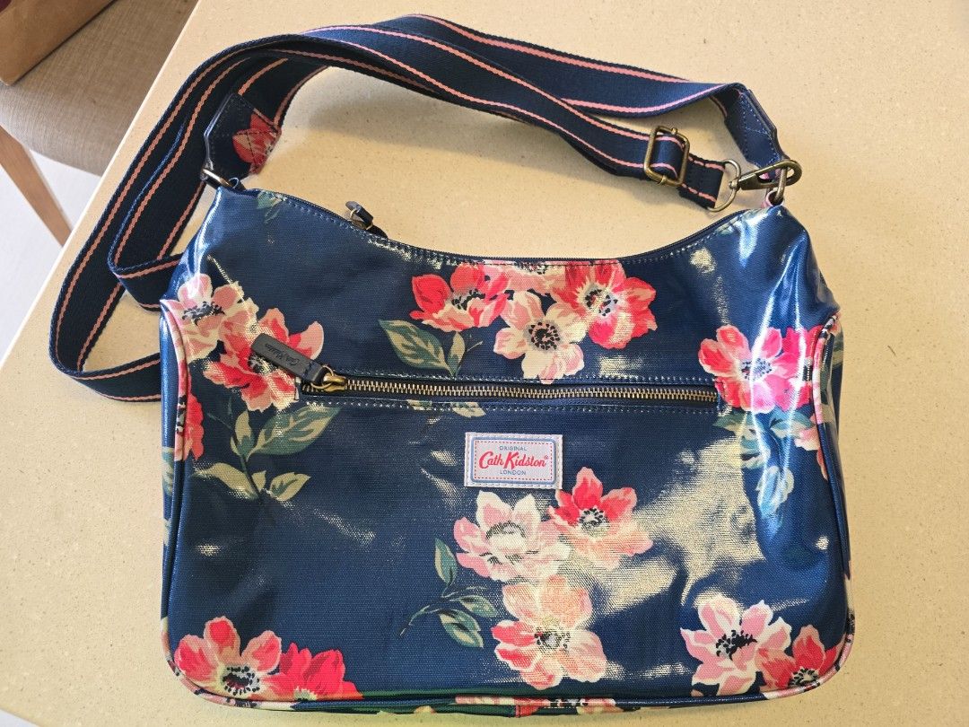 Authentic Cath Kidston Sling Bag used once as good as new. Selling for 120.negotiable for fast price