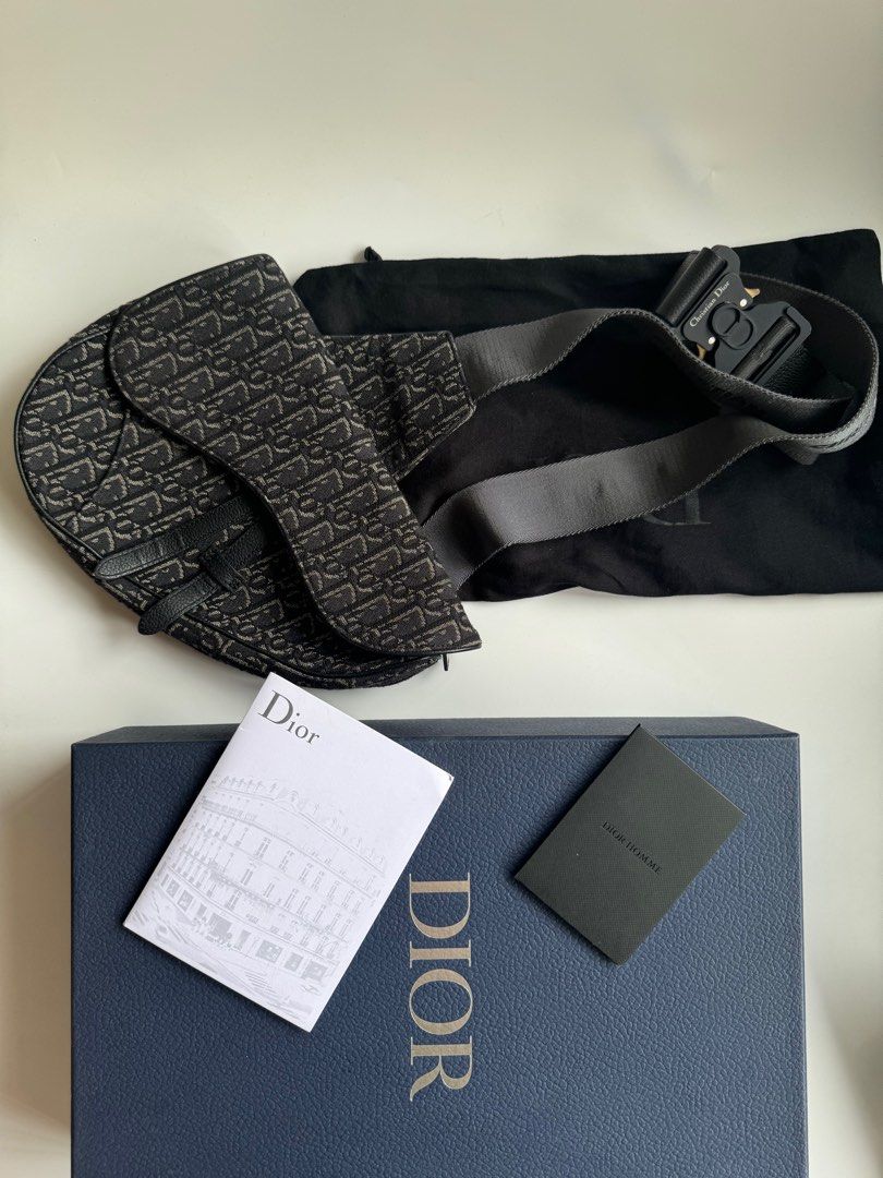 Authentic Christian Dior Men's Saddle Bag (Category: Luxury Bags & Wallets) located in San Mateo. Submitted by dailyluxemnl (Listing ID 1330958006, Image 2). Description: Top off your streetwear look with this Black Oblique Jacquard Saddle Bag! ⚠️ Condition: 10/10 Rank: Good as New (check our ranking guide in our highlights to see the description for our ranks) Material: Canvas Inclusions: Box, Receipt, Original Dust Bag, Cards.