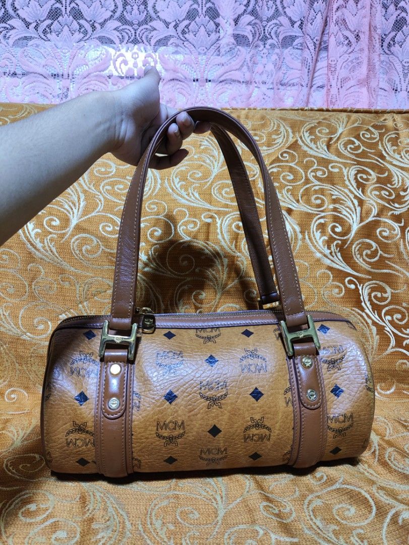 Authentic MCM Papillon Rare Barrel Bag (Category: Luxury Bags & Wallets) located in Tigaon. Submitted by preownedjpnpicks.ph (Listing ID 1324685135, Image 2). Description: Guaranteed authentic 💯 Rank AB Turnable screws with white tag Money back guarantee if proven fake by professionals Japan Source 🇯🇵 Pm for more photos Wala na pong tatawad sagad na last price na yan mga ma'am/sir. Auto decline po pag nag tawad pa. Strictly payment first thru 